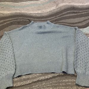 Blue turtleneck cropped sweater